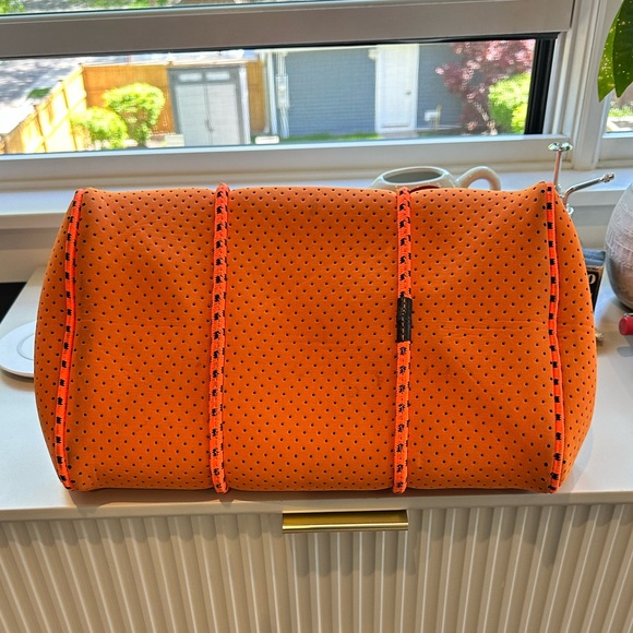 Neoprene tote in bright orange and black. - Picture 3 of 3